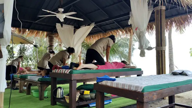 Beachfront Thai massage at Blue Haven Bay on Koh Chang with professional therapists providing relaxing wellness treatments by the sea