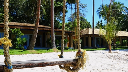 Traditional rope swing on the beach at Peninsula Beach Resort Koh Chang